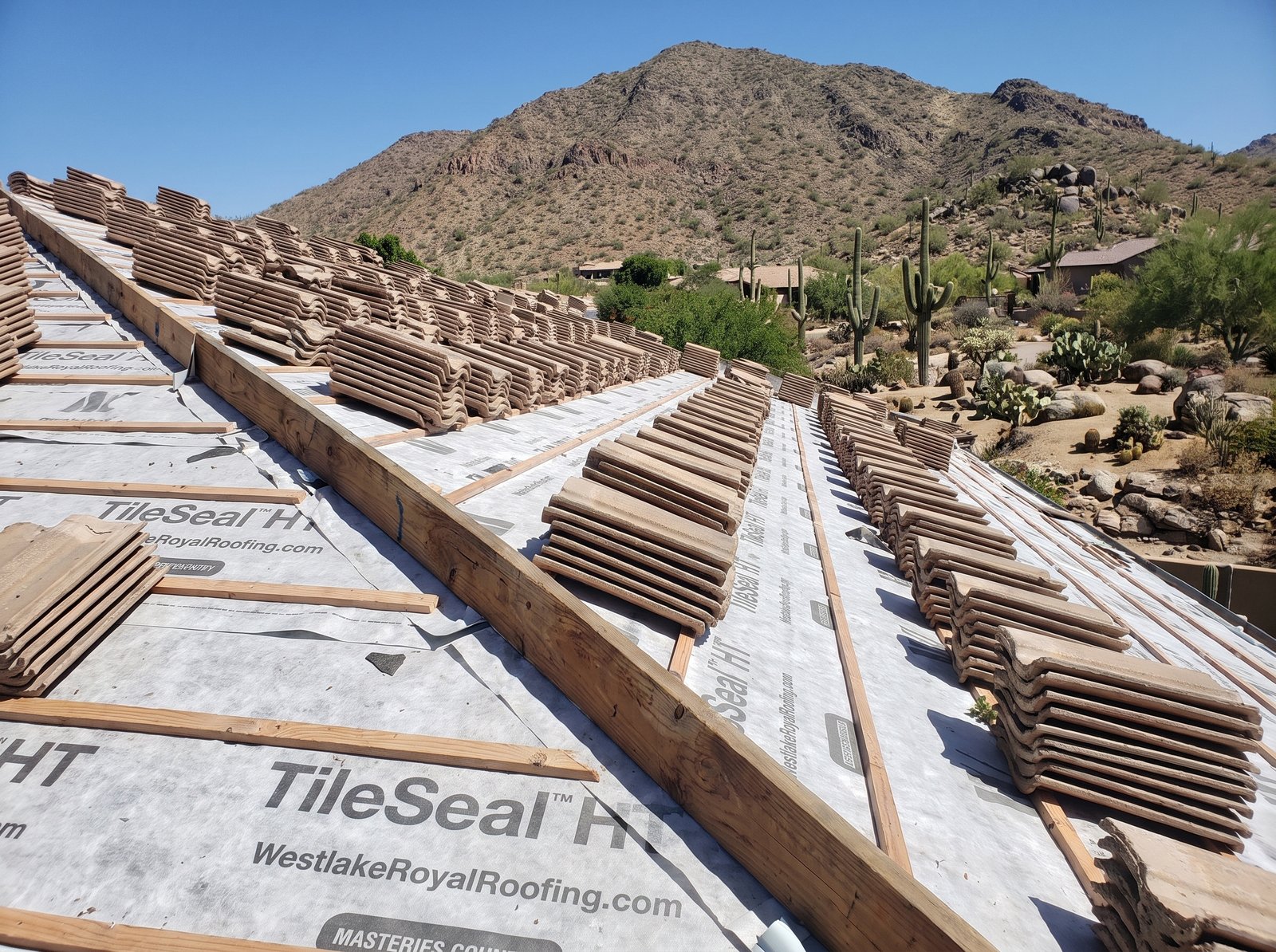 Westlake Royal TileSeal HT high-temp SBS underlayment installed under new tile on a Rio Verde, Arizona roof, with desert mountains behind