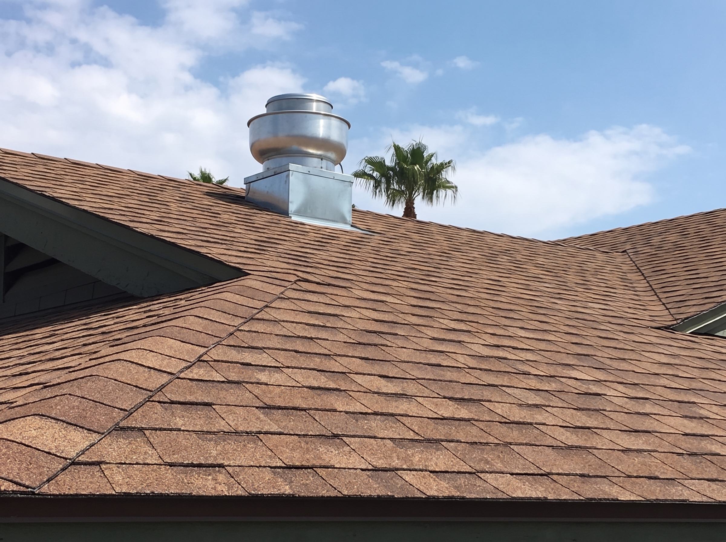 Newly installed asphalt shingle roof with turbine vent, Phoenix area