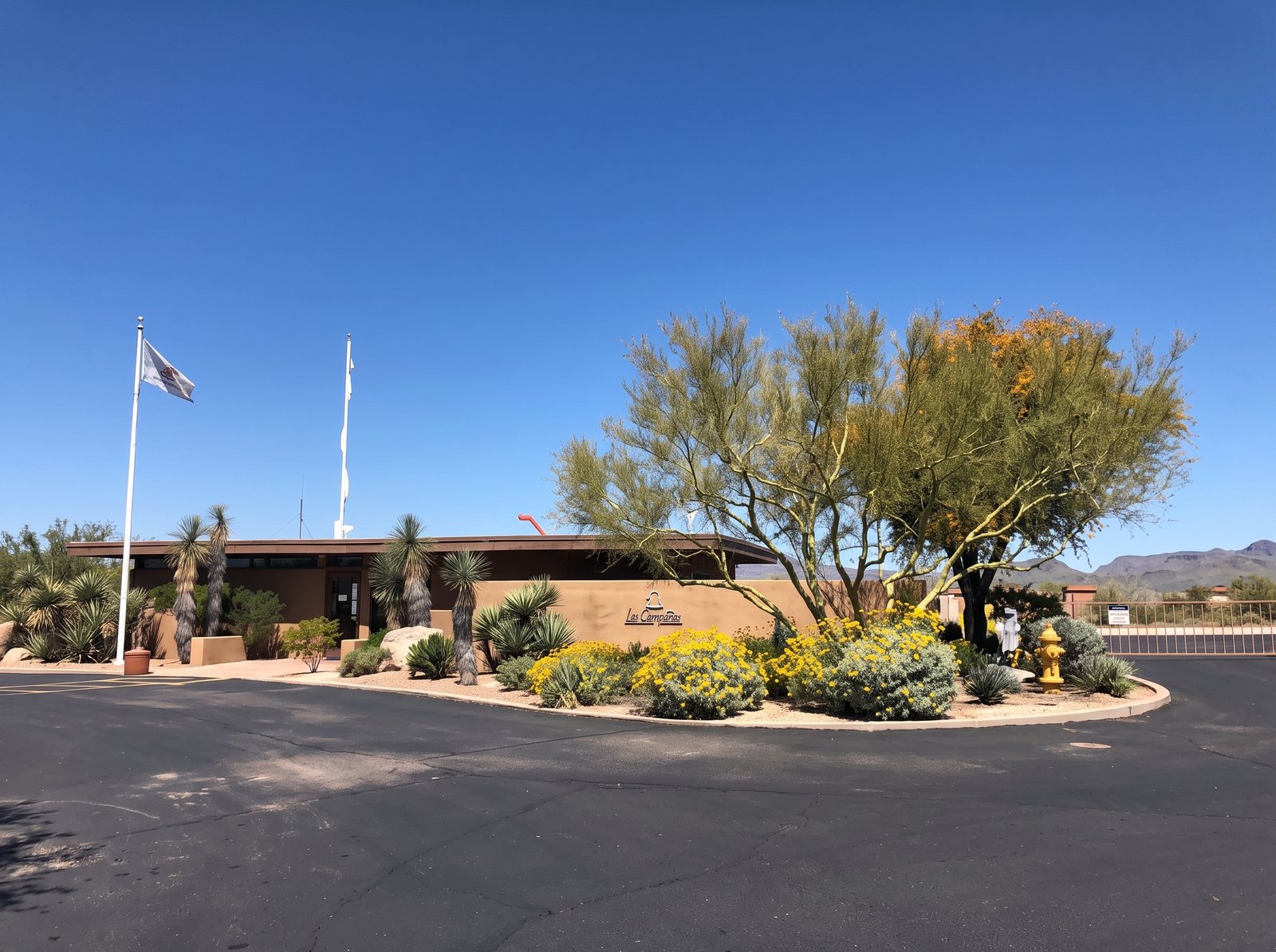The terminal building at Sky Ranch at Carefree, with its low-slope foam roof and desert landscaping